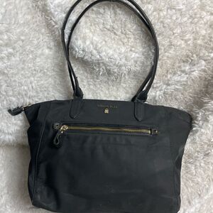 Michael Black Nylon Medium shoulder bag with gold tone hardwares.